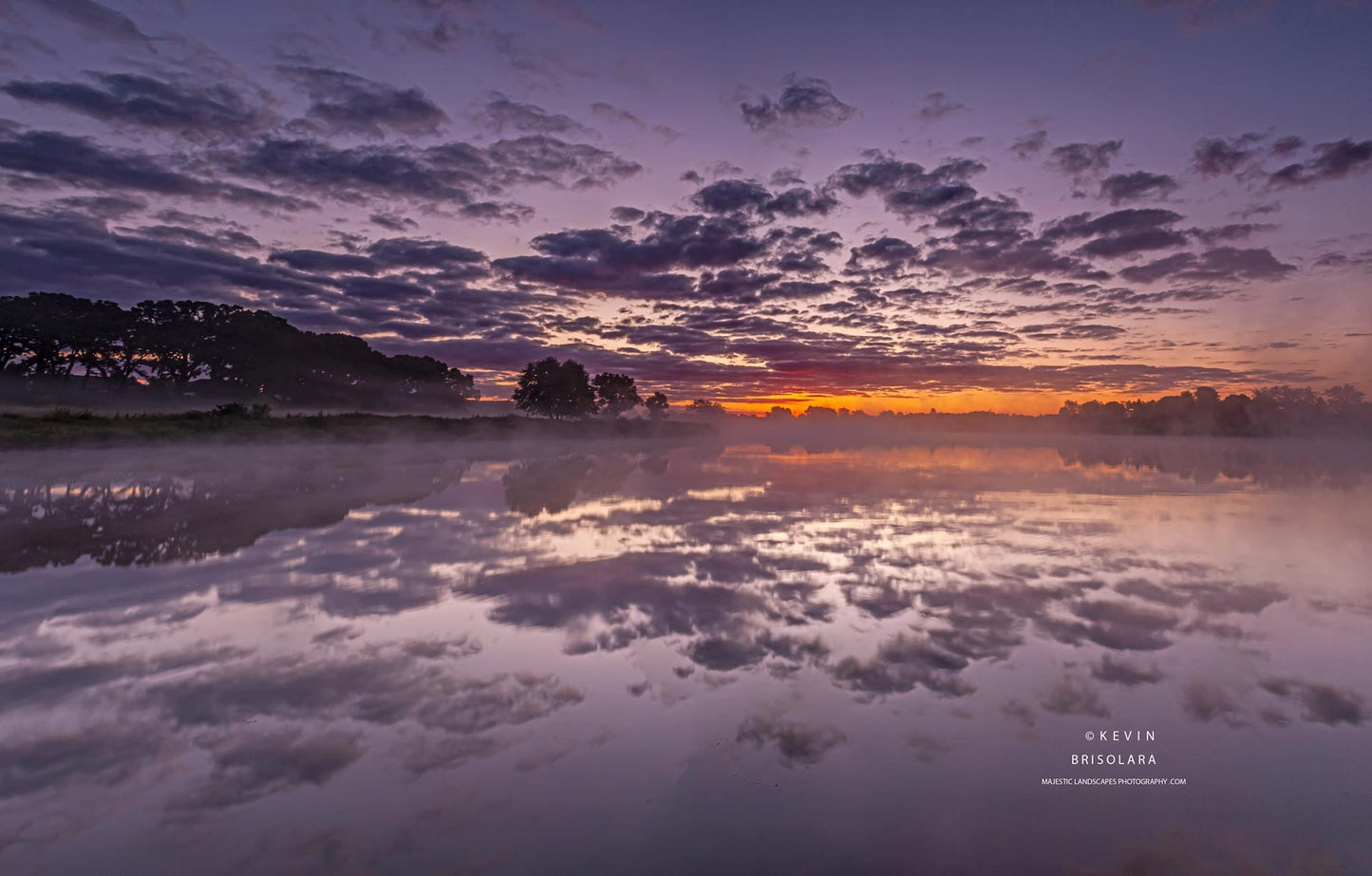 A CLOUDY SUNRISE FROM THE LAKE