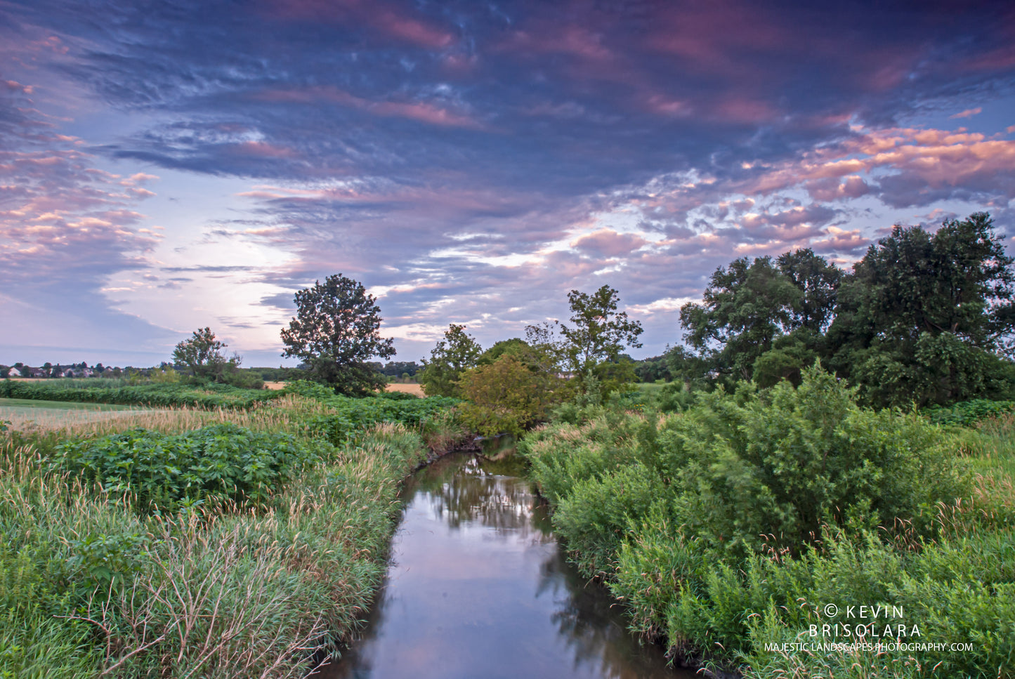 A JULY SUNRISE ALONG THE RIVER