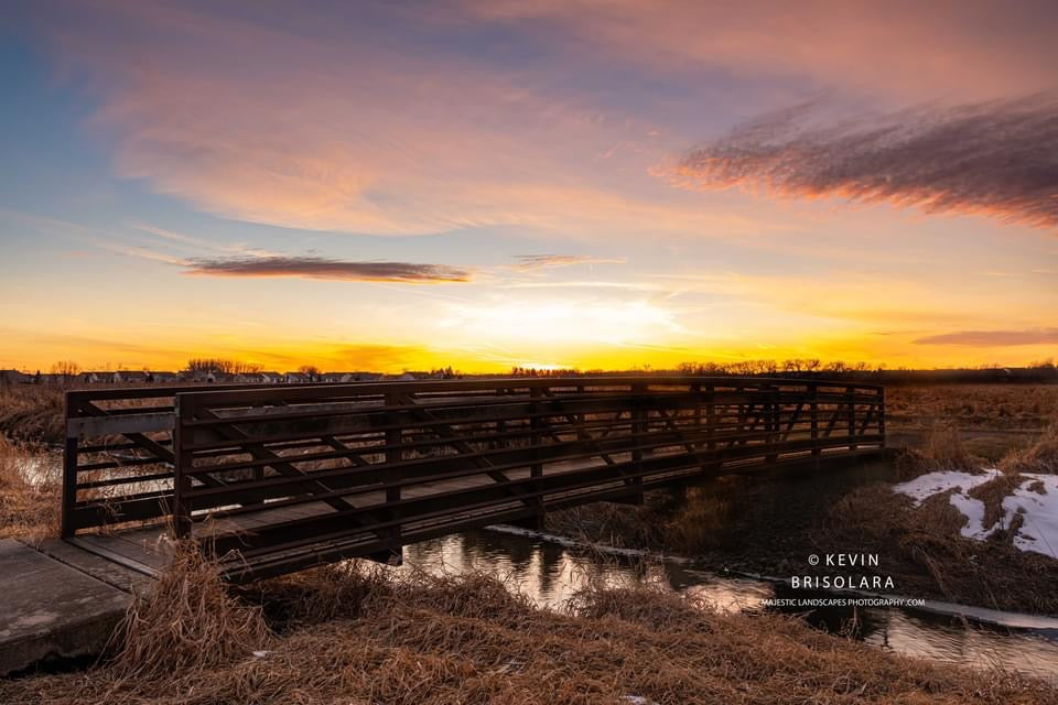 A PRAIRIE SUNSET FROM THE RIVER